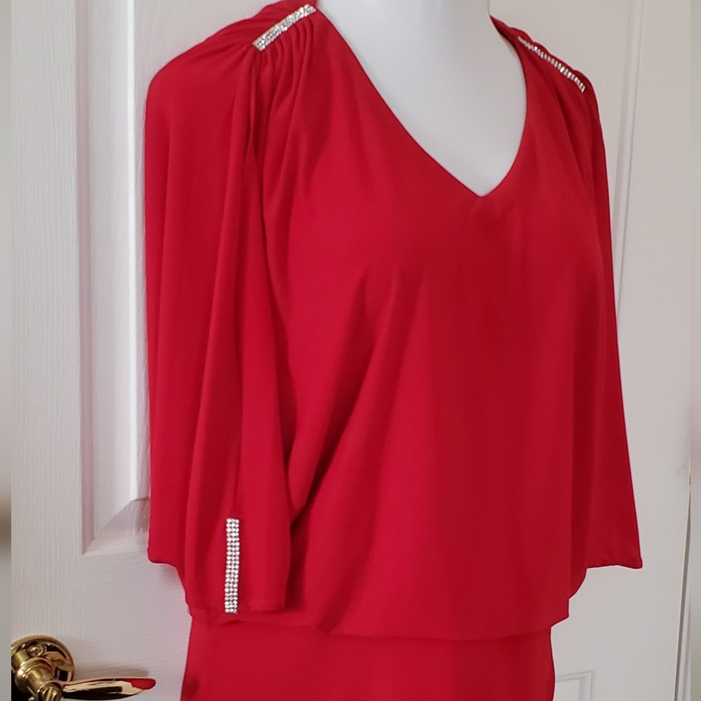 Elegant V neck blouse with rhinestones. S. Levine. M